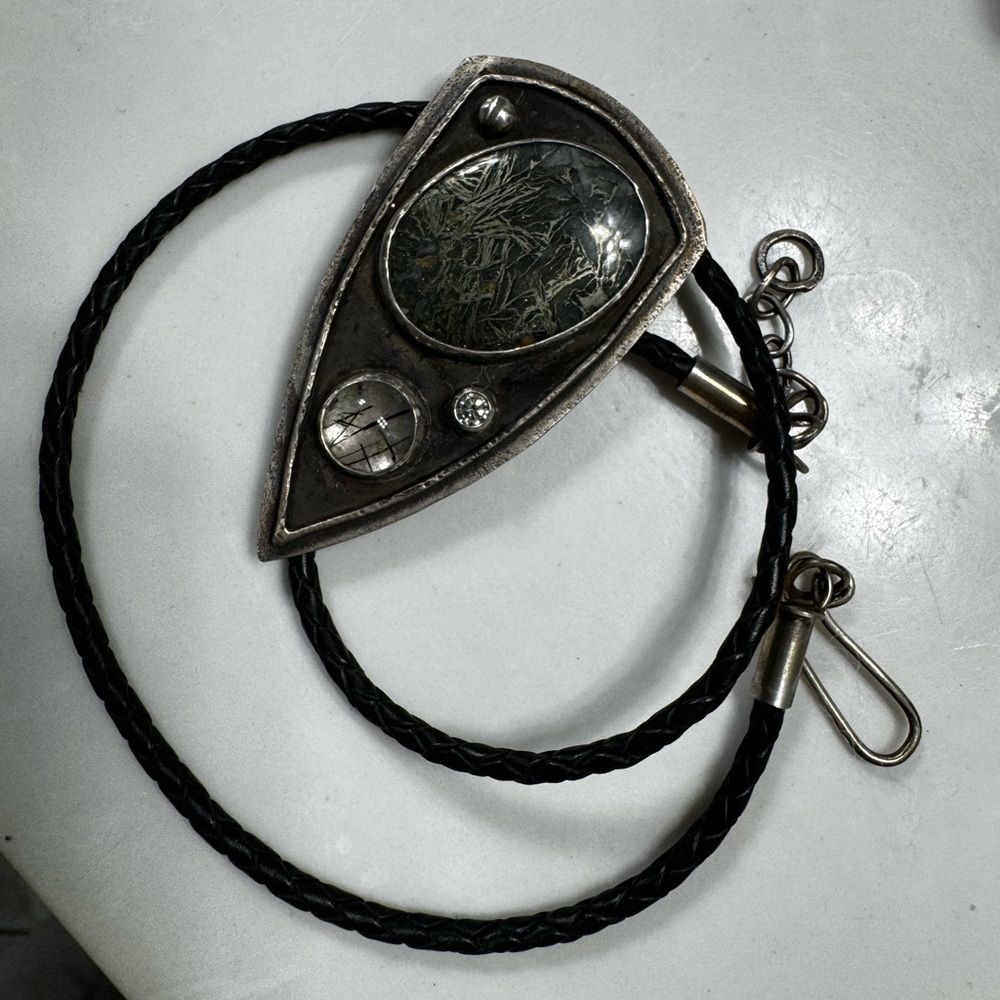 Custom Sterling Silver Fossilized Stone with Rutialted Quartz on Leather